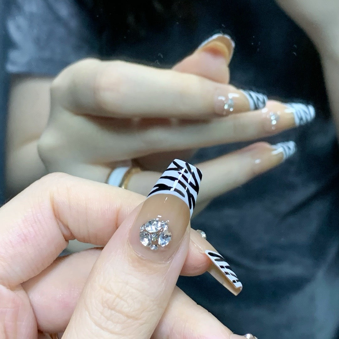 Zebra Chic French Tips Nails