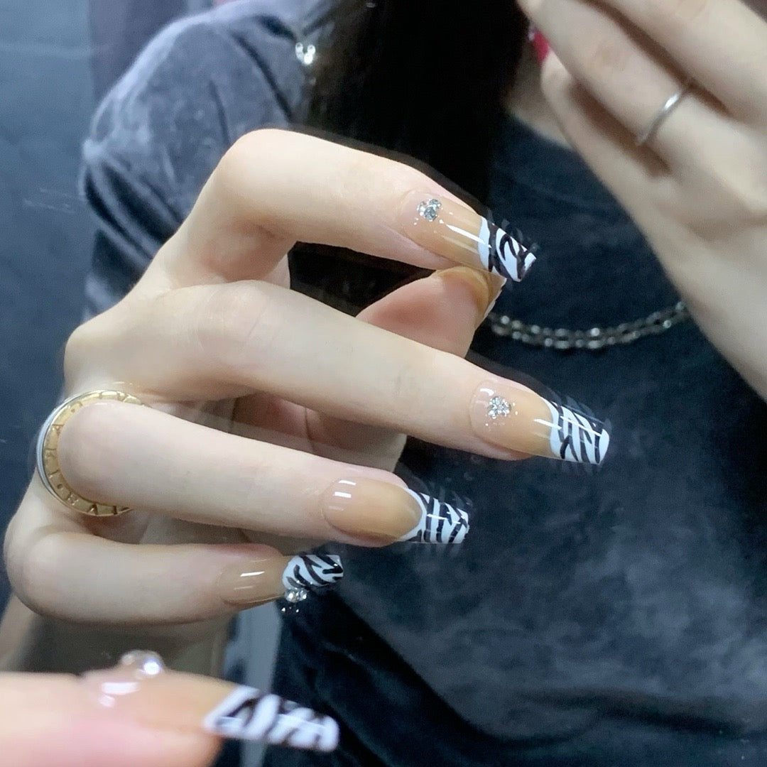 Zebra Chic French Tips Nails